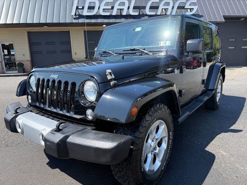 Used 2015 Jeep Wrangler Unlimited Sahara w/ Connectivity Group AWD/4WD image 1