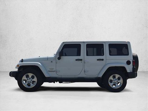 Used 2015 Jeep Wrangler Unlimited Sahara w/ Dual Top Group AWD/4WD image 9