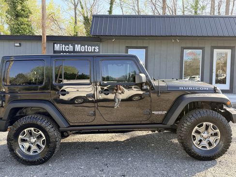 Used 2013 Jeep Wrangler Unlimited Rubicon w/ Dual Top Group image 2