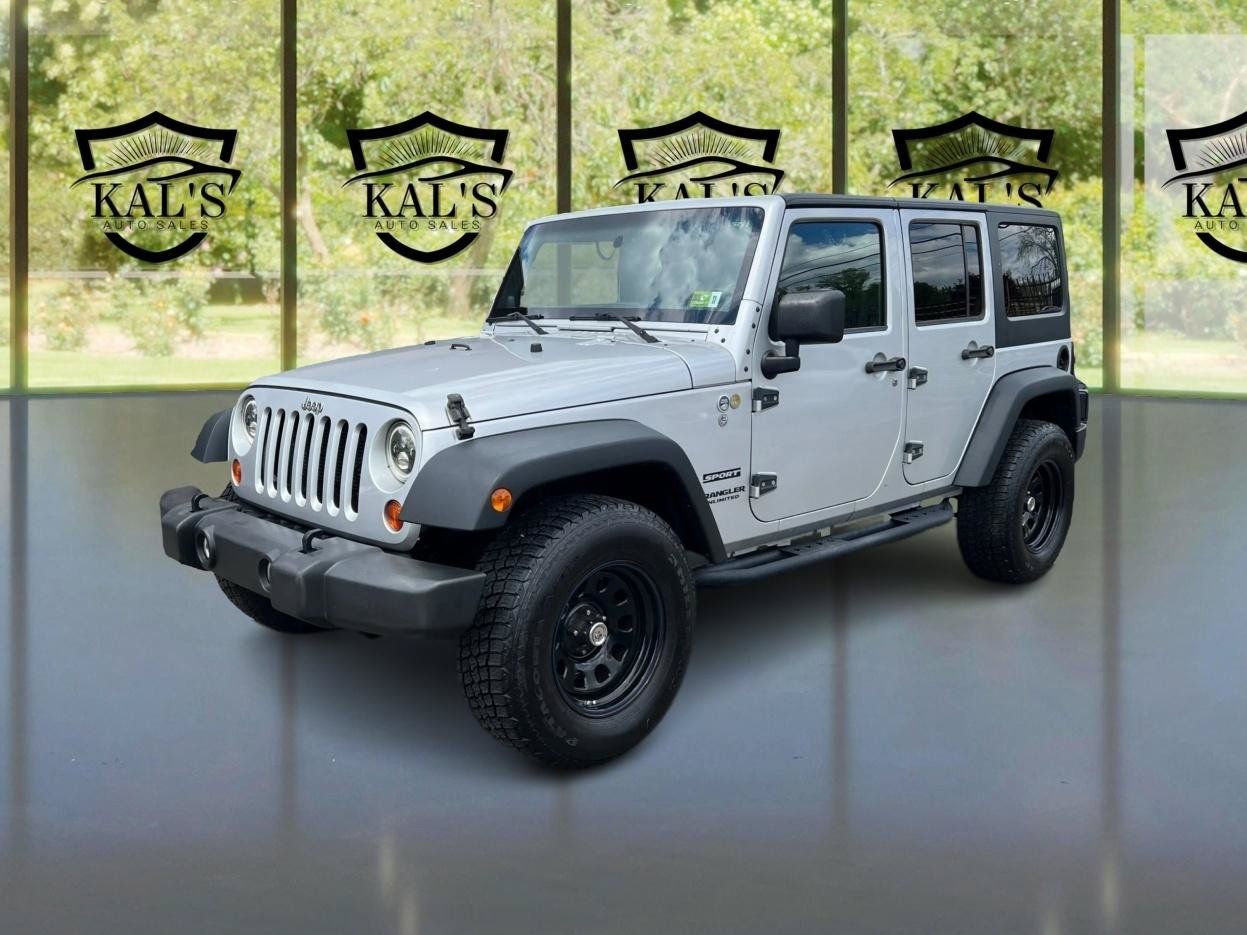 Used 2012 Jeep Wrangler Unlimited Sport AWD/4WD image 1