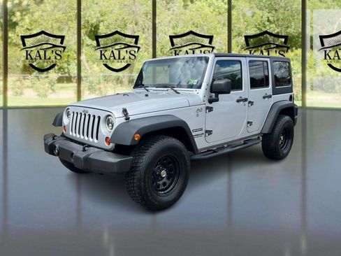 Used 2012 Jeep Wrangler Unlimited Sport AWD/4WD image 1