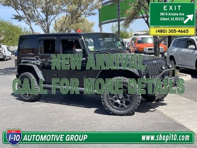 Used 2014 Jeep Wrangler Unlimited Rubicon w/ Dual Top Group