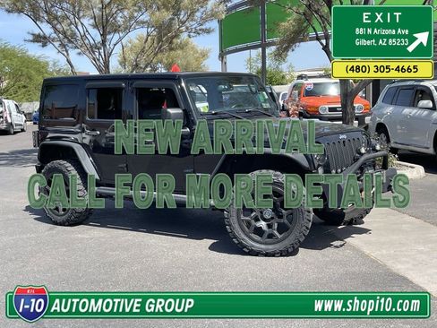 Used 2014 Jeep Wrangler Unlimited Rubicon w/ Dual Top Group AWD/4WD image 1