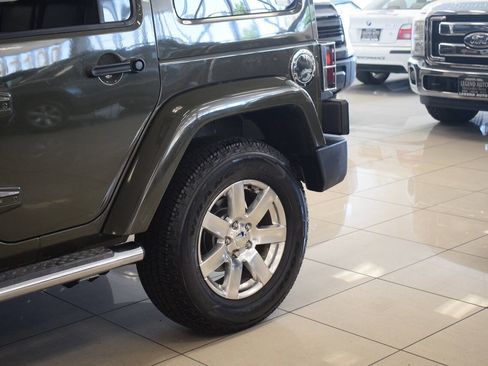 Used 2015 Jeep Wrangler Unlimited Sahara w/ Dual Top Group AWD/4WD image 23