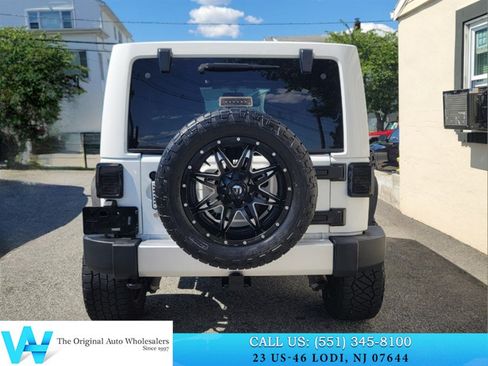 Used 2014 Jeep Wrangler Unlimited Sahara w/ Dual Top Group AWD/4WD image 5