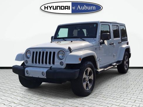 Used 2016 Jeep Wrangler Unlimited Sahara w/ Max Tow Package AWD/4WD image 12