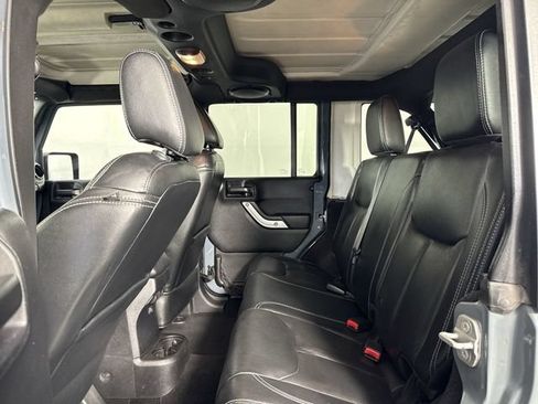 Used 2014 Jeep Wrangler Unlimited Sahara w/ Dual Top Group AWD/4WD image 20