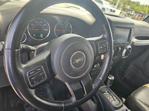 Used 2016 Jeep Wrangler Unlimited Sahara w/ Dual Top Group AWD/4WD image 16
