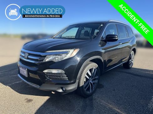 Used 2016 Honda Pilot Touring image 1