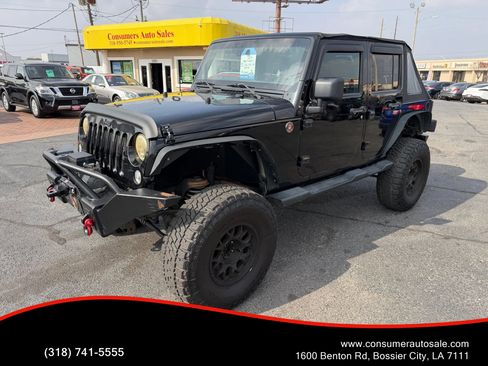 Used 2014 Jeep Wrangler Unlimited Sahara image 1