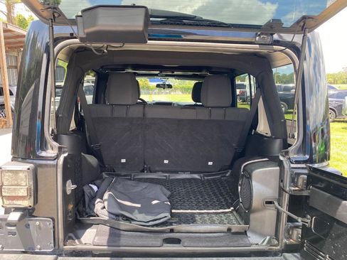 Used 2012 Jeep Wrangler Unlimited Sahara w/ Dual Top Group AWD/4WD image 18