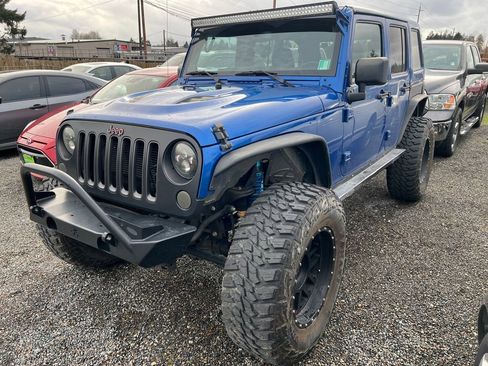 Used 2014 Jeep Wrangler Unlimited Sport AWD/4WD image 1
