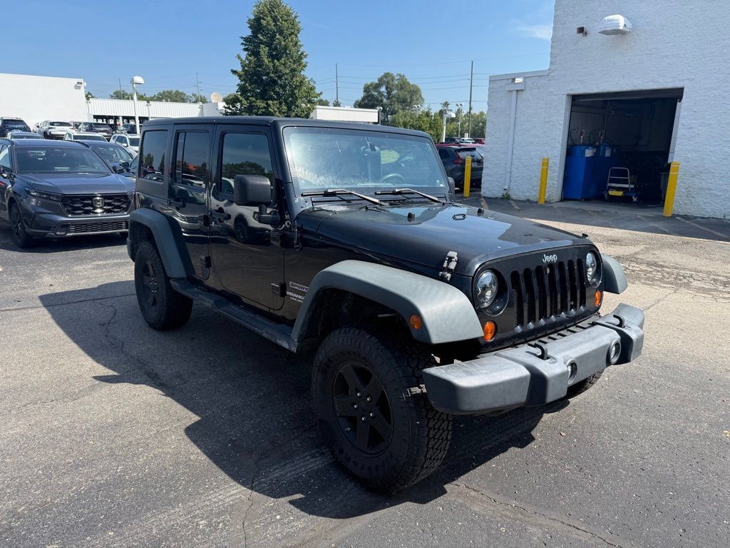 Used 2011 Jeep Wrangler Unlimited Sport w/ Trailer Tow Group AWD/4WD image 4