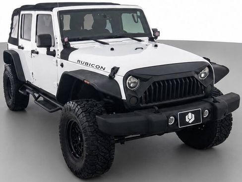 Used 2015 Jeep Wrangler Unlimited Rubicon w/ Connectivity Group AWD/4WD image 1