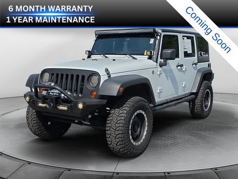 Used 2013 Jeep Wrangler Unlimited Sahara w/ Connectivity Group AWD/4WD image 1
