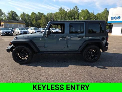 Used 2015 Jeep Wrangler Unlimited Sport w/ Dual Top Group AWD/4WD image 6