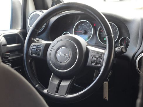 Used 2012 Jeep Wrangler Unlimited Sahara w/ Dual Top Group AWD/4WD image 14