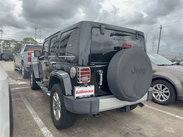 Used 2012 Jeep Wrangler Unlimited Sahara w/ Dual Top Group AWD/4WD image 5