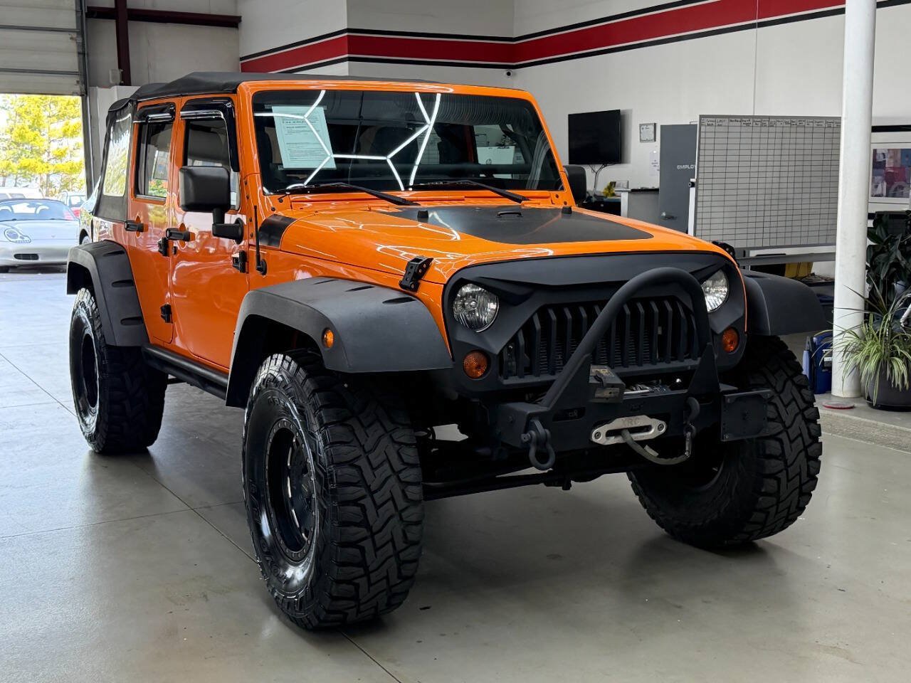 Used 2012 Jeep Wrangler Unlimited Sport AWD/4WD image 1