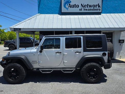 Used 2010 Jeep Wrangler Unlimited Sport AWD/4WD image 1