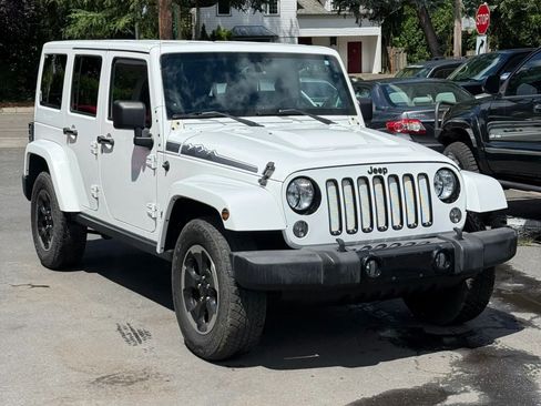 Used 2014 Jeep Wrangler Unlimited Sahara AWD/4WD image 1