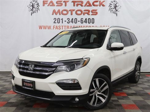 Used 2018 Honda Pilot Touring image 1