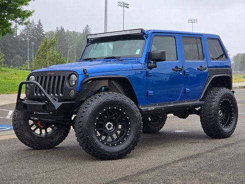 Used 2014 Jeep Wrangler Unlimited Sport AWD/4WD image 1