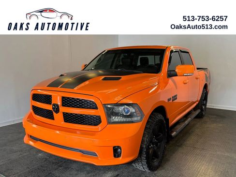 Used 2015 RAM 1500 Sport w/ Ignition Orange Sport Package AWD/4WD image 1