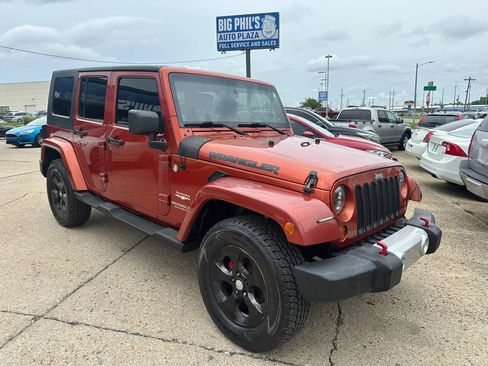 Used 2009 Jeep Wrangler Unlimited Sahara w/ Limited Group AWD/4WD image 1