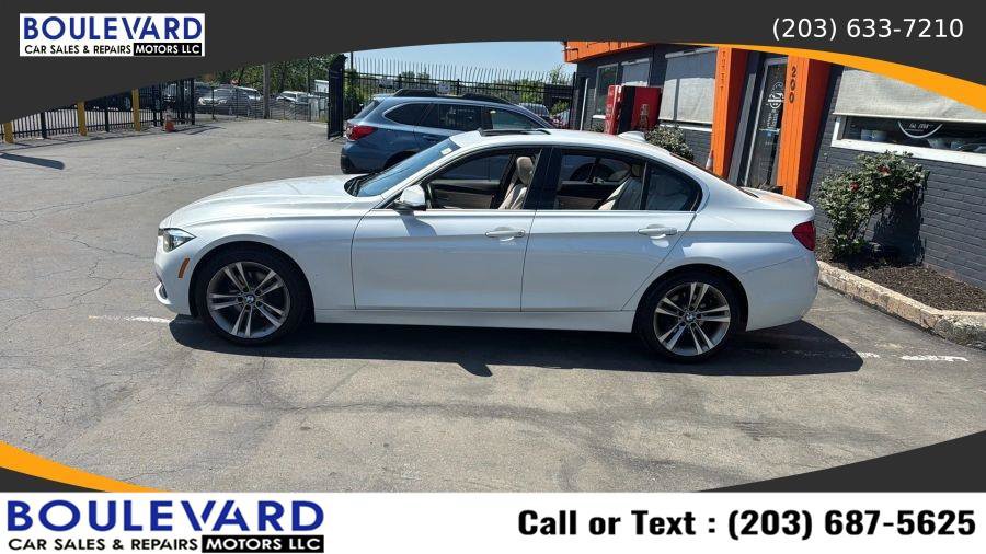 Used 2017 BMW 330i xDrive Sedan AWD/4WD image 4