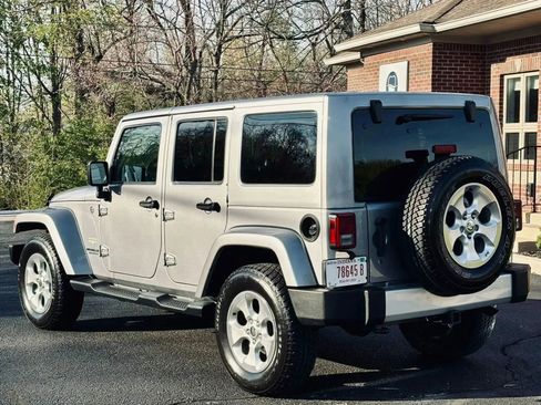 Used 2014 Jeep Wrangler Unlimited Sahara w/ Dual Top Group image 8