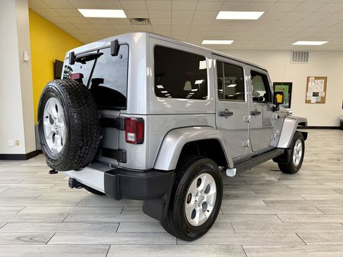 Used 2014 Jeep Wrangler Unlimited Sahara w/ Dual Top Group AWD/4WD image 6