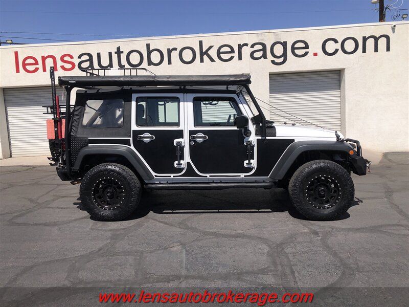 Used 2014 Jeep Wrangler Unlimited Sport AWD/4WD image 1