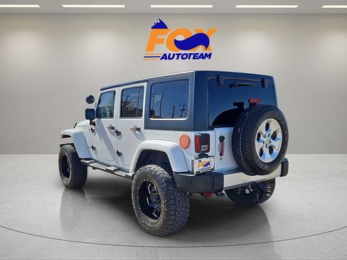 Used 2013 Jeep Wrangler Unlimited Sahara w/ Dual Top Group AWD/4WD image 3