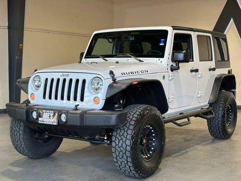 Used 2015 Jeep Wrangler Unlimited Rubicon w/ Connectivity Group AWD/4WD image 1