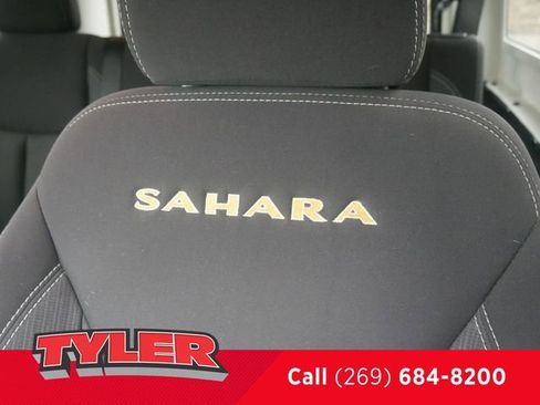 Used 2013 Jeep Wrangler Unlimited Sahara w/ Dual Top Group AWD/4WD image 32