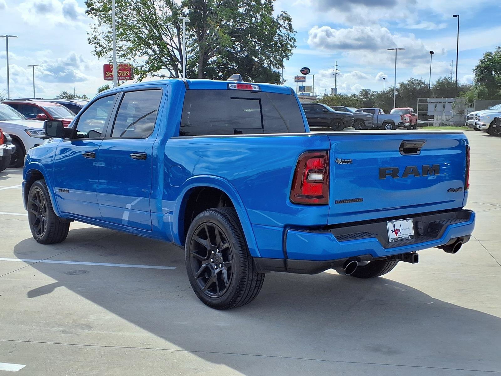 Used 2025 RAM 1500 Laramie w/ Night Edition AWD/4WD image 2