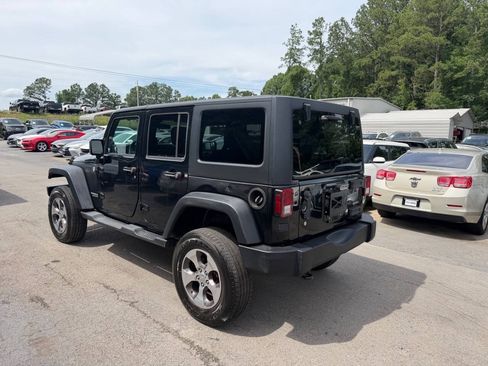 Used 2012 Jeep Wrangler Unlimited Rubicon w/ Dual Top Group AWD/4WD image 7
