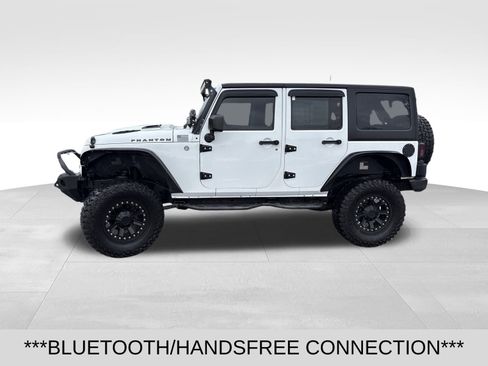 Used 2014 Jeep Wrangler Unlimited Sahara w/ Max Tow Package image 2
