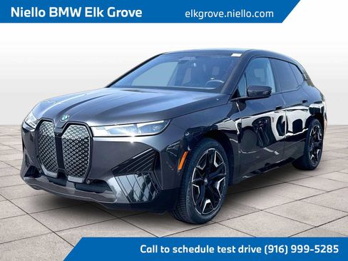 Used 2024 BMW iX xDrive50 w/ Sport Package AWD/4WD image 1