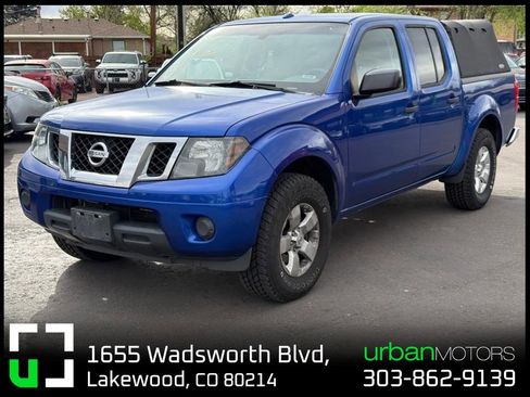 Used 2013 Nissan Frontier SV image 1