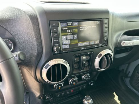 Used 2014 Jeep Wrangler Unlimited Sahara w/ Max Tow Package AWD/4WD image 16
