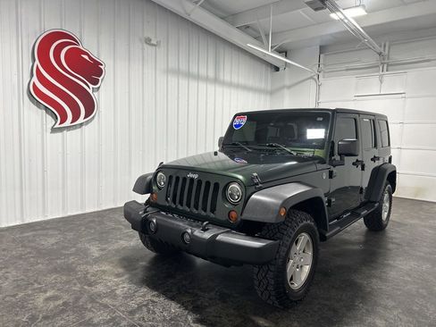 Used 2012 Jeep Wrangler Unlimited Sport AWD/4WD image 1