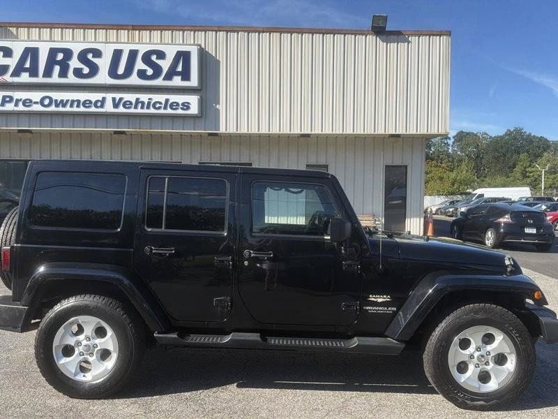 Used 2014 Jeep Wrangler Unlimited Sahara w/ Dual Top Group AWD/4WD image 9