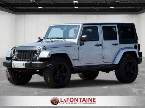 Used 2015 Jeep Wrangler Unlimited Sahara w/ Trailer Tow Group AWD/4WD image 1