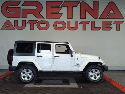 Used 2013 Jeep Wrangler Unlimited Sahara w/ Connectivity Group AWD/4WD image 1