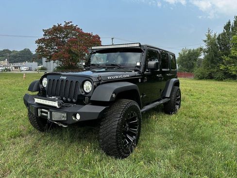 Used 2014 Jeep Wrangler Unlimited Rubicon w/ Connectivity Group AWD/4WD image 2