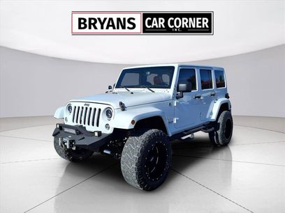 Used 2015 Jeep Wrangler Unlimited Sahara w/ Dual Top Group