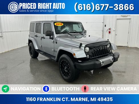 Used 2018 Jeep Wrangler Unlimited Sahara w/ Connectivity Group AWD/4WD image 1