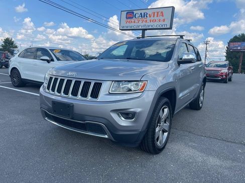 Used 2014 Jeep Grand Cherokee Limited AWD/4WD image 1